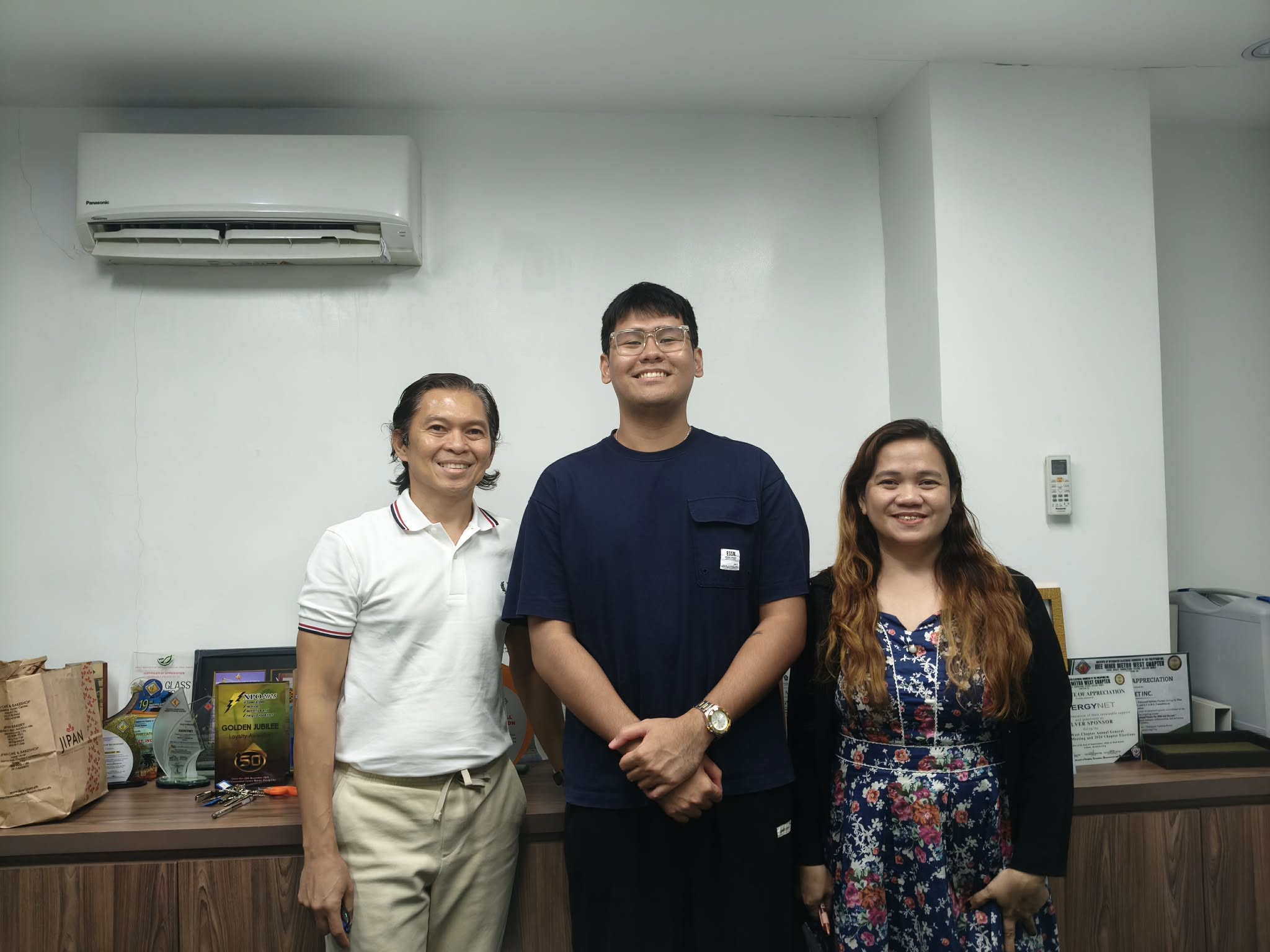BuildFast Labs founder Carl Saguinsin with EnergyNet Inc. leadership at their custom ERP project